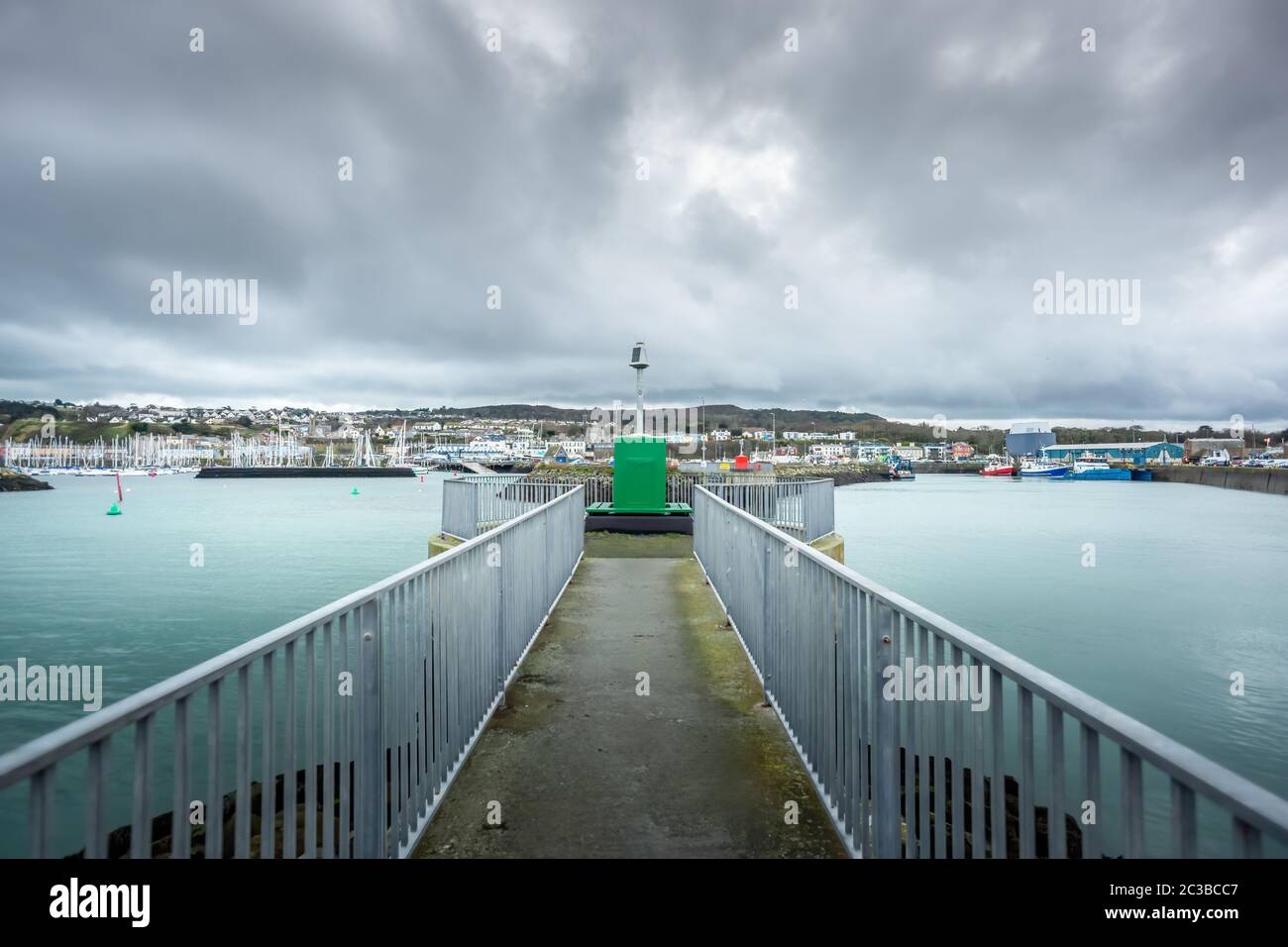 Viewpoint on Howth harbour with fishing boats and yachts in marina Stock Photo