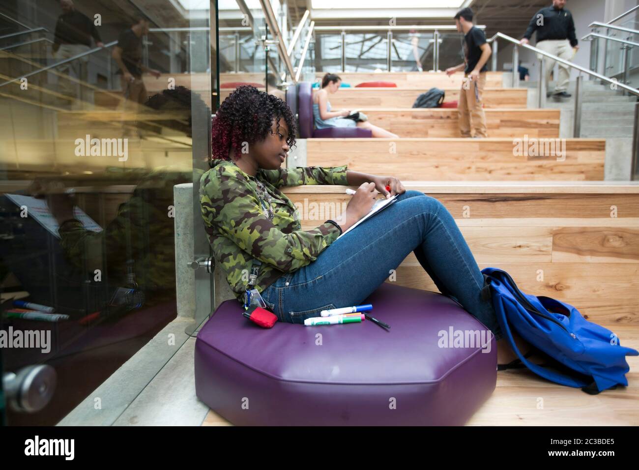 Austin Community College Female AfricanAmerican student relaxes in