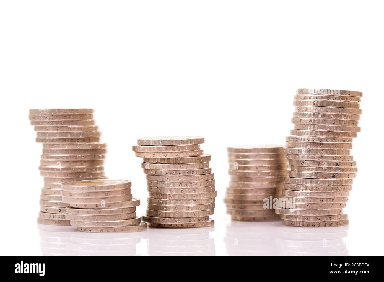 Heap of two euro coins isolated on white background Stock Photo - Alamy
