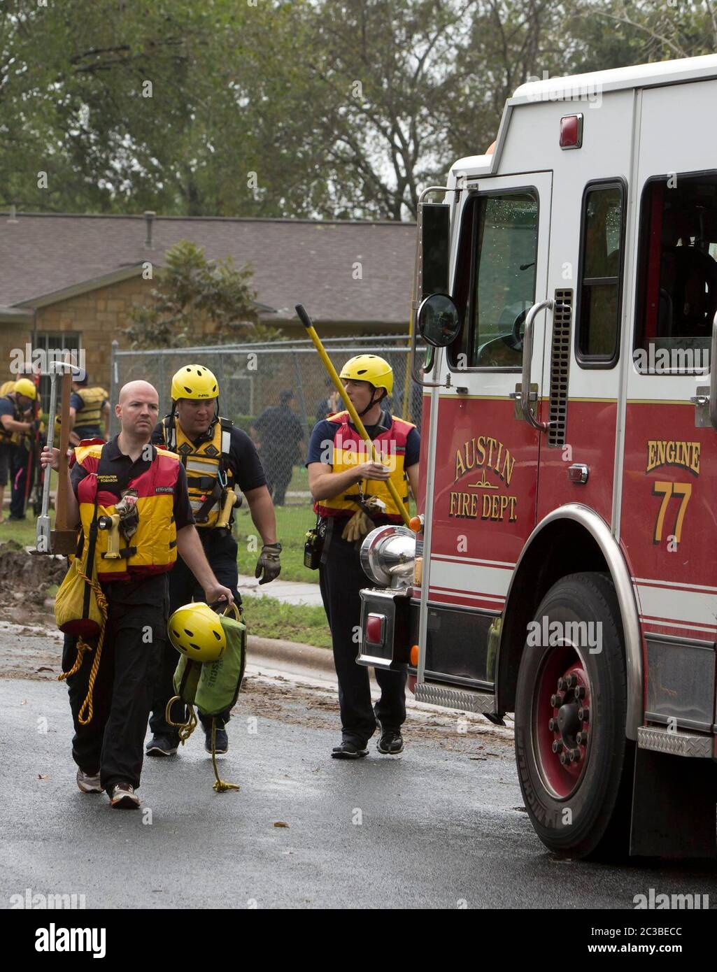 Austin, Texas USA, October 30 2015: Emergency workers including  firefighters  prepare to help or rescue residents from high water in the Onion Creek neighborhood. The creek flooded earlier in the day after the area received more than 11 inches of rain since midnight.  ©Marjorie Kamys Cotera/Daemmrich Photography Stock Photo