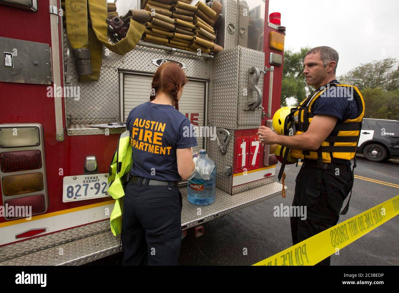 Austin, Texas USA, October 30 2015: Emergency workers including  firefighters  prepare to help or rescue residents from high water in the Onion Creek neighborhood. The creek flooded earlier in the day after the area received more than 11 inches of rain since midnight.  ©Marjorie Kamys Cotera/Daemmrich Photography Stock Photo