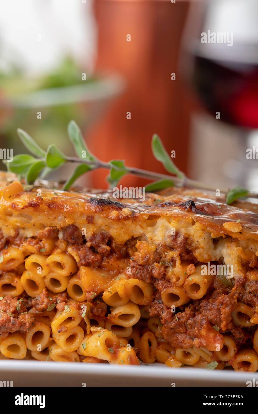 greek pastizio noodle dish with cheese Stock Photo - Alamy