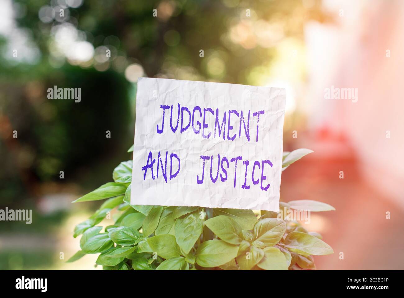 Conceptual hand writing showing Judgement And Justice. Concept