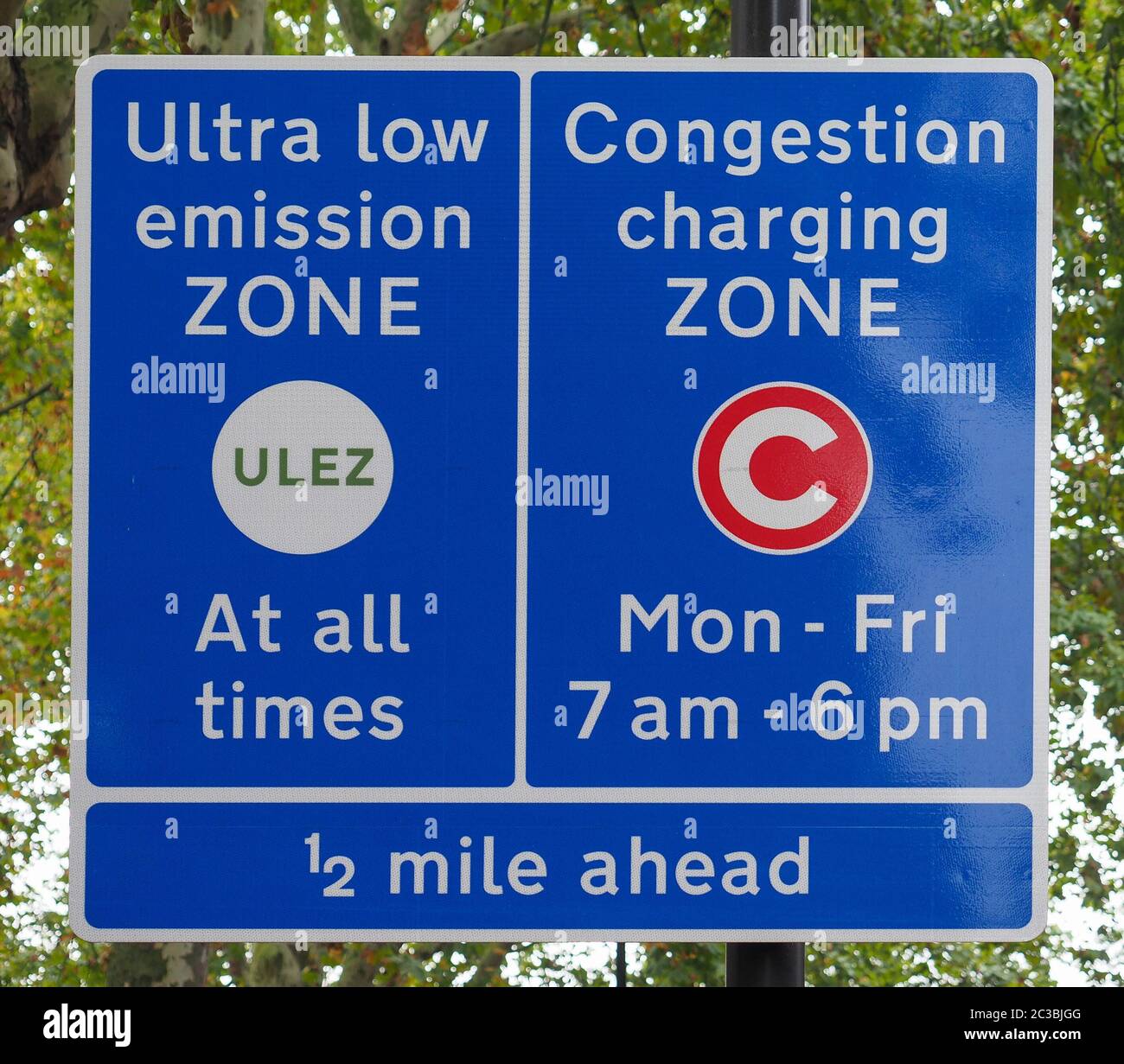 ULEZ (Ultra low emission zone at all times) and C (Congestion charging zone) signs in London, UK Stock Photo