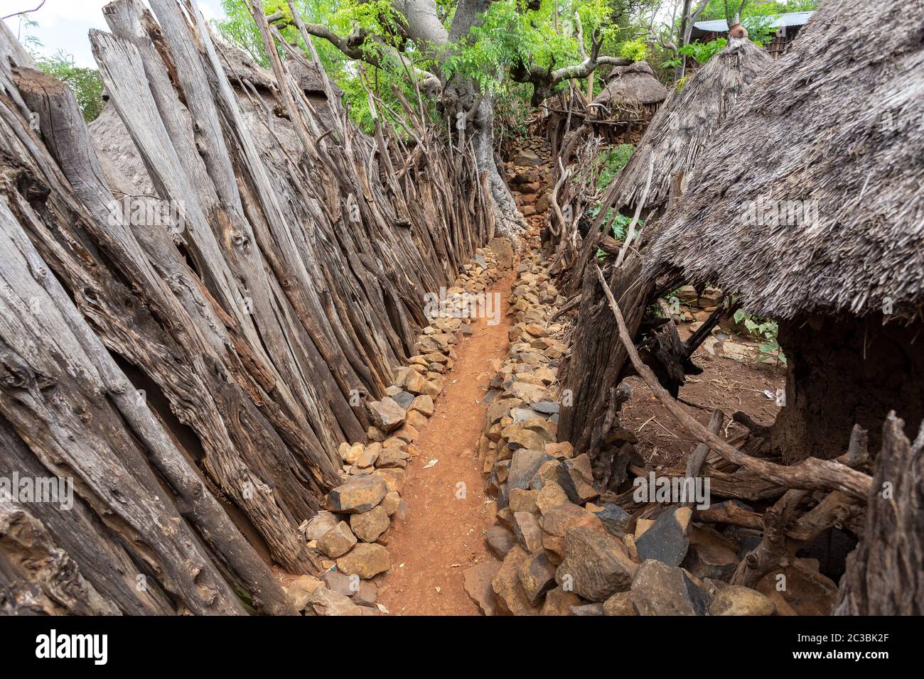Narrow pathway in Konso, walled village tribes Konso. Africa, Ethiopia. Konso villages are listed as UNESCO World Heritage sites. Stock Photo
