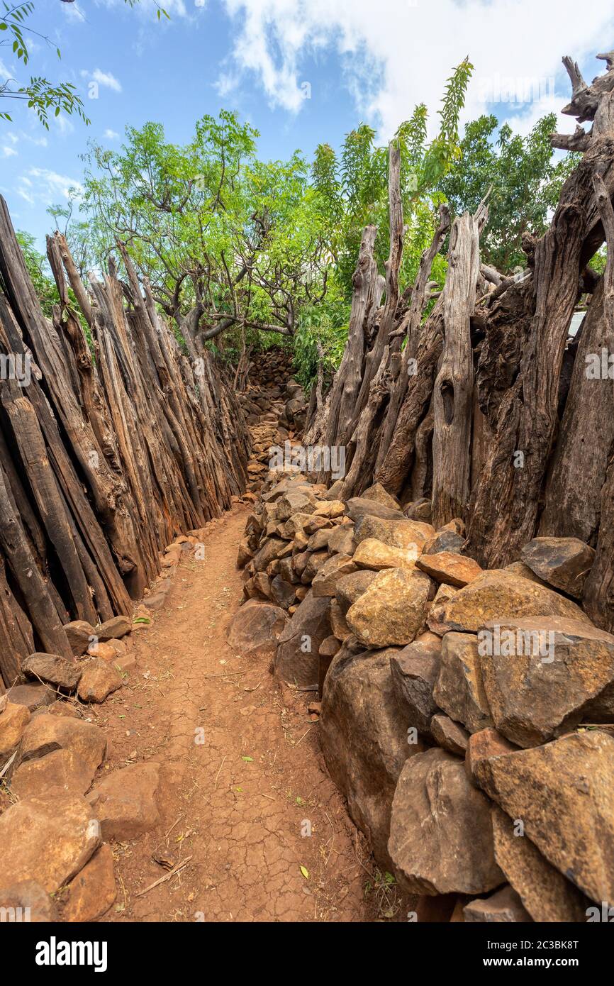 Narrow pathway in Konso, walled village tribes Konso. Africa, Ethiopia. Konso villages are listed as UNESCO World Heritage sites. Stock Photo