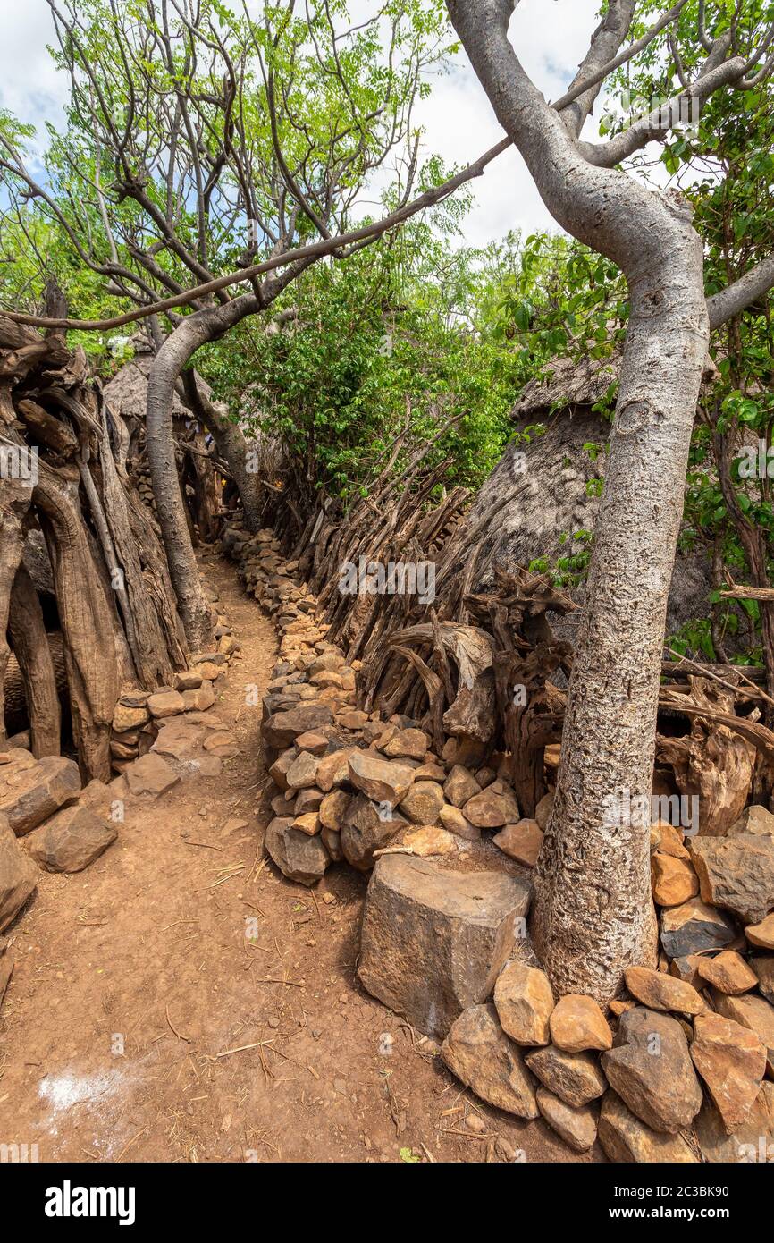 Narrow pathway in Konso, walled village tribes Konso. Africa, Ethiopia. Konso villages are listed as UNESCO World Heritage sites. Stock Photo