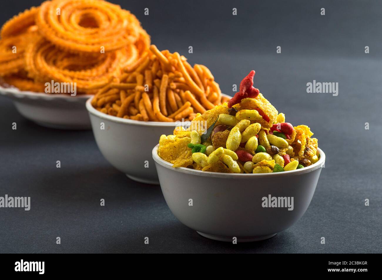 Indian Snack : Chakli, chakali or Murukku and Besan (Gram flour) Sev and chivada or chiwada. Diwali Food Stock Photo
