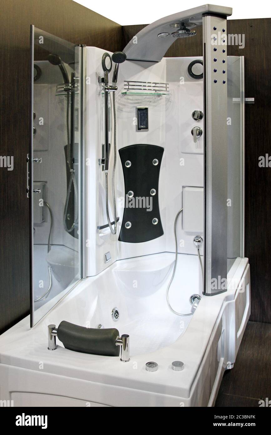 Modern bathtub and shower with hydro massage jets Stock Photo Alamy