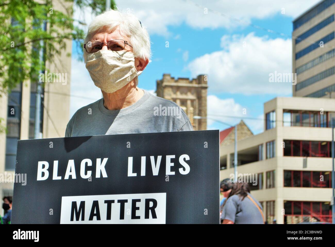 Dayton, Ohio, United States 05/30/2020 protesters at a black lives matter rally holding signs and wearing masks Stock Photo
