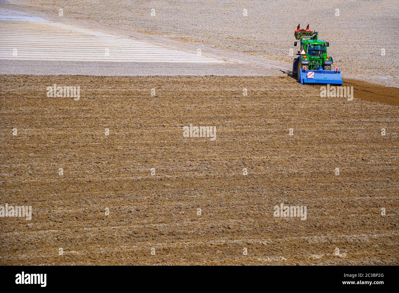 Tractor in a Plowed Field Stock Photo - Alamy