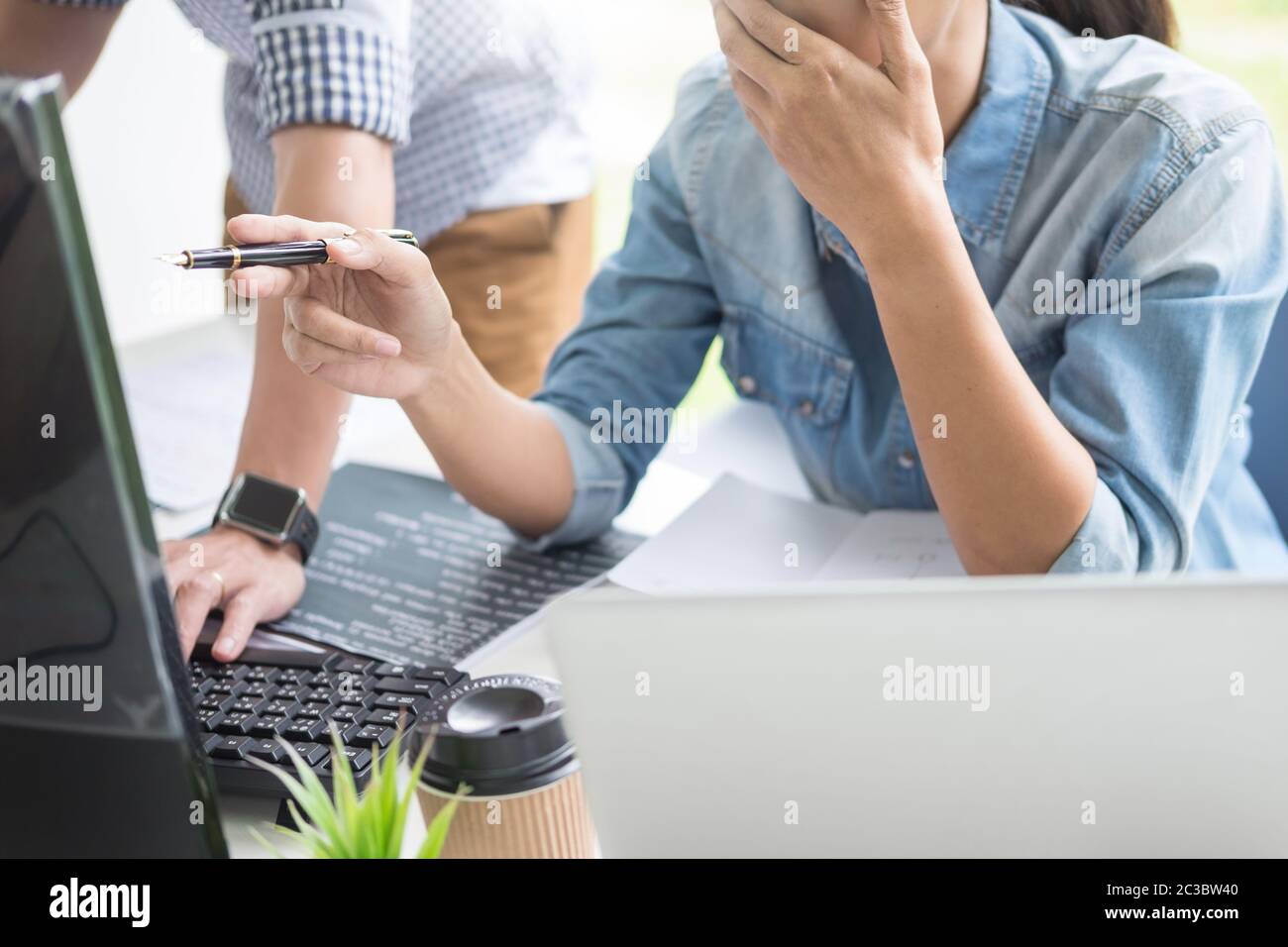 Asian team Outsource Developer Looking Screen Programming Code Working ...