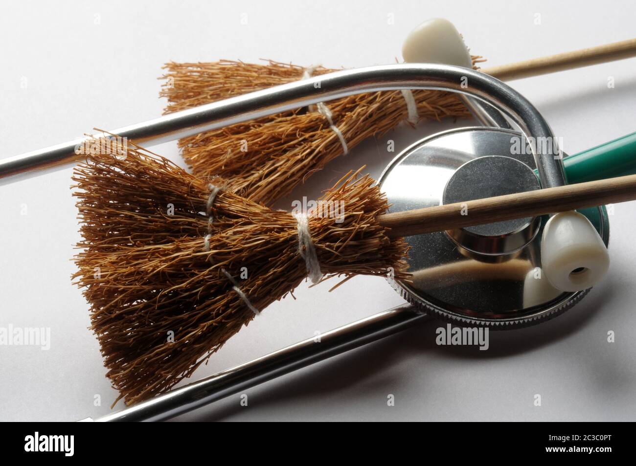 Close up on stethoscope with brooms Stock Photo