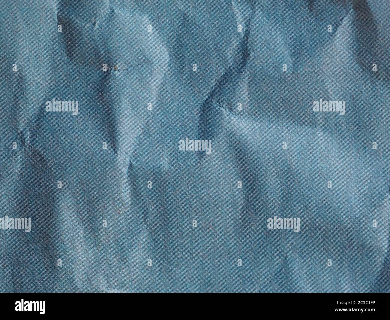 blue crinkled paper texture useful as a background Stock Photo
