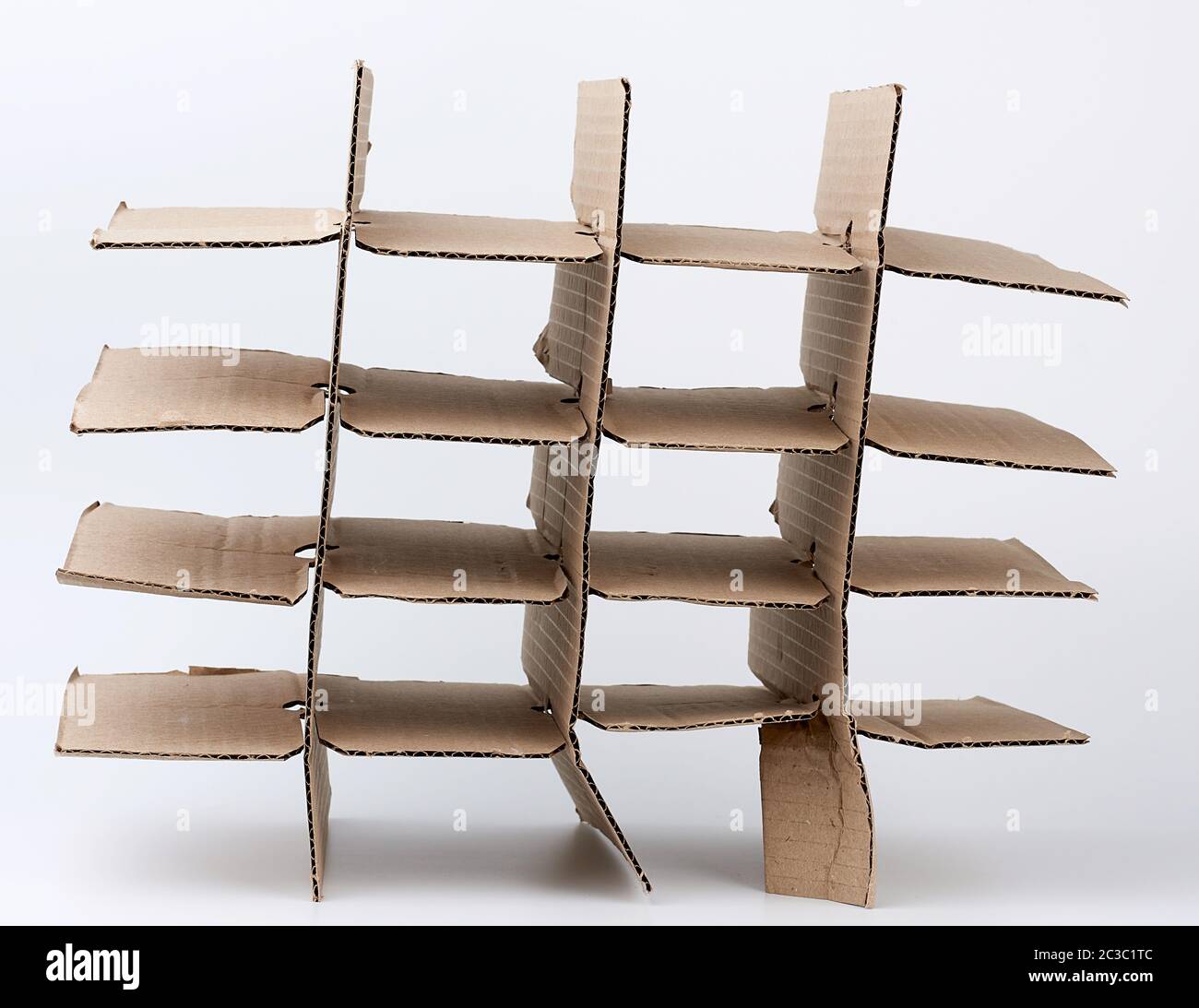 brown cardboard partition for a box, a subject for transporting bottles on a white background Stock Photo