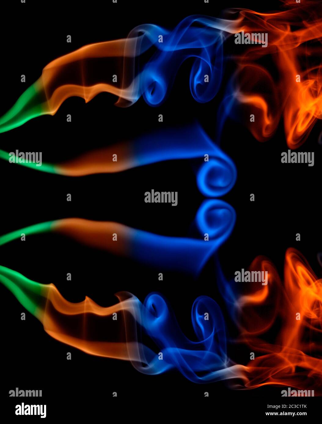 abstract colored smoke in a black background Stock Photo - Alamy