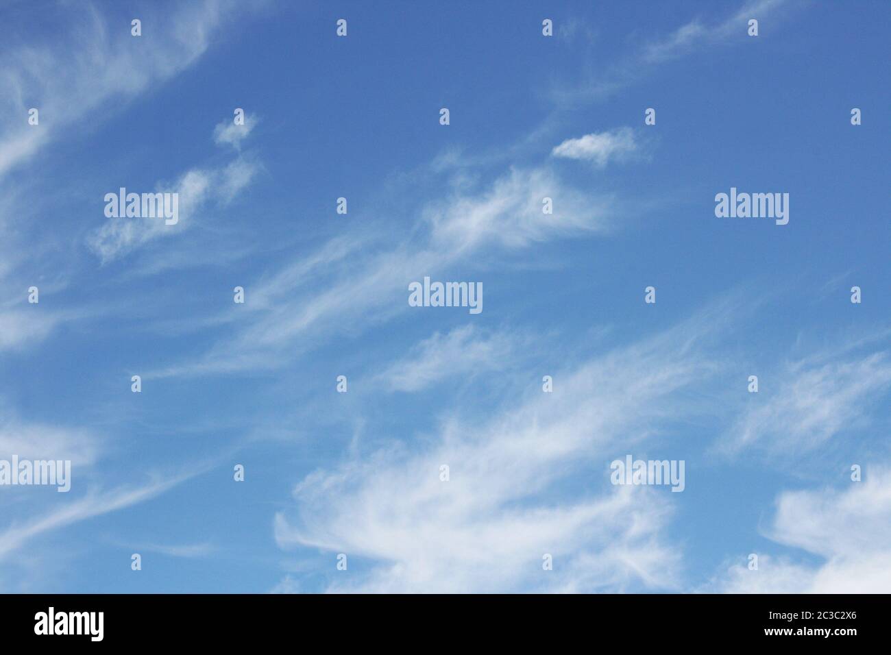 Big fluffy clouds (Altocumulus) with beautiful blue skies Stock Photo