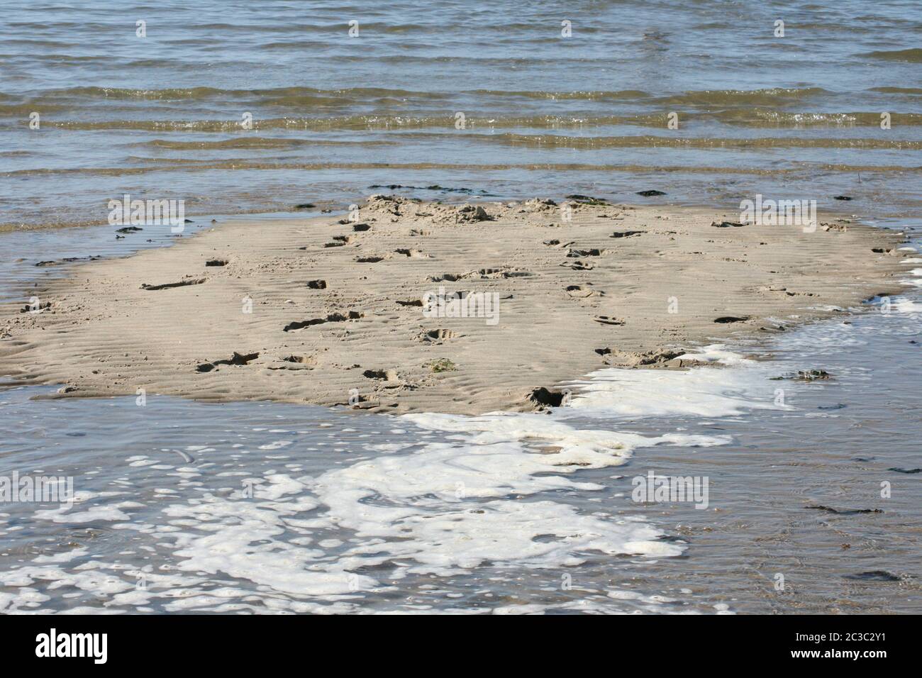 A washed by water small sandy island Stock Photo