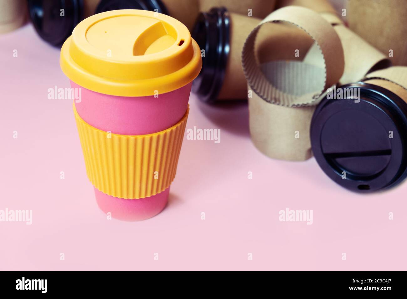 Zero waste concept Stylish reusable eco coffee cup and multiple single