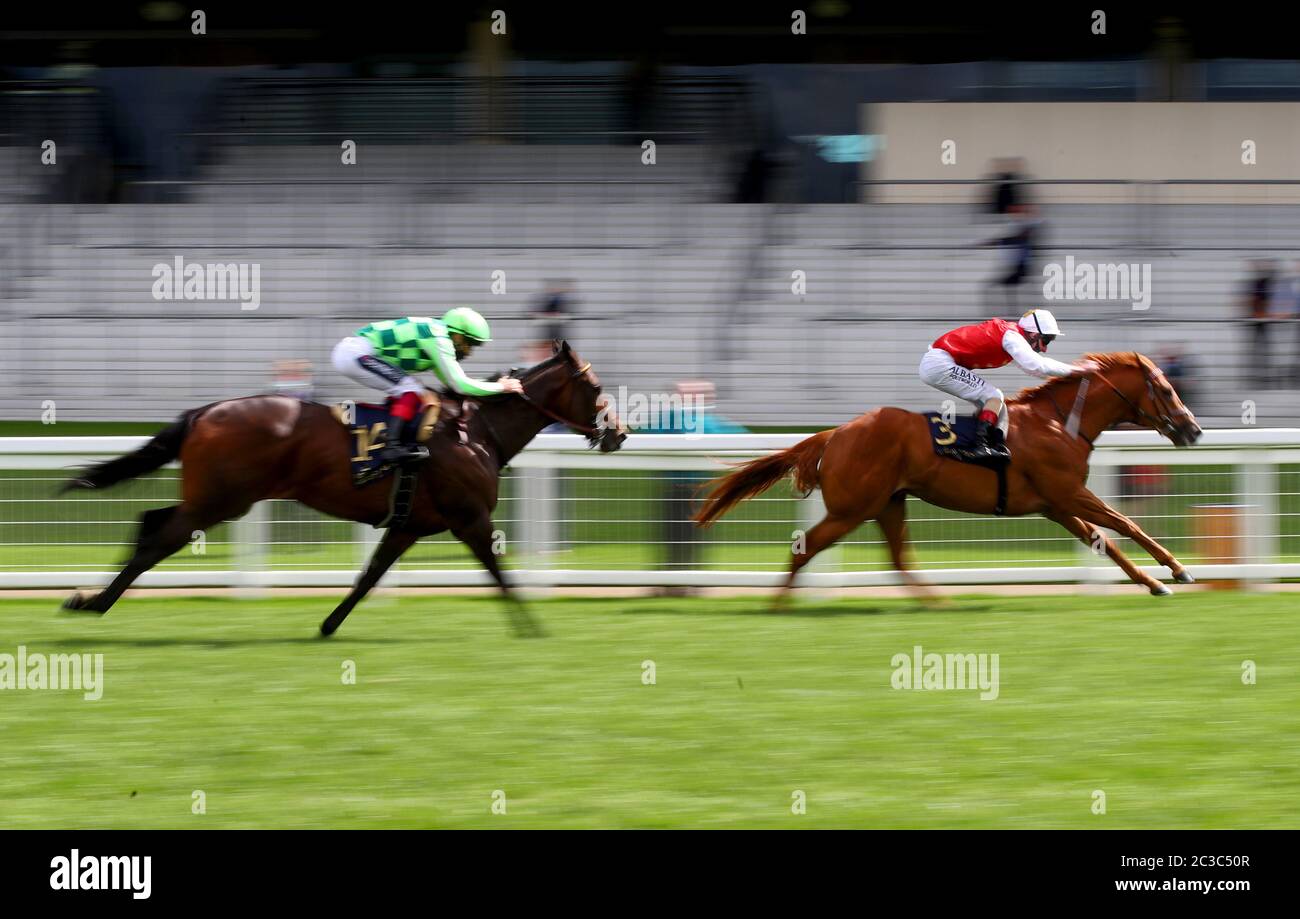 Adam Kirby riding Golden Horde (right) to win The Commonwealth Cup during day four of Royal Ascot at Ascot Racecourse. Stock Photo