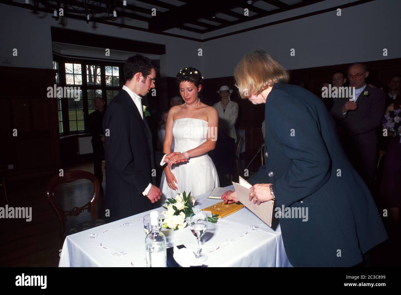 Bride and Groom taking Vows at Wedding with Registrar England Stock Photo