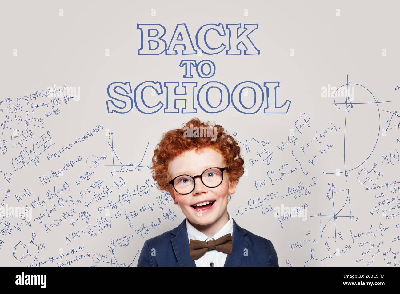 Funny kid student with science formulas. Back to school concept Stock Photo