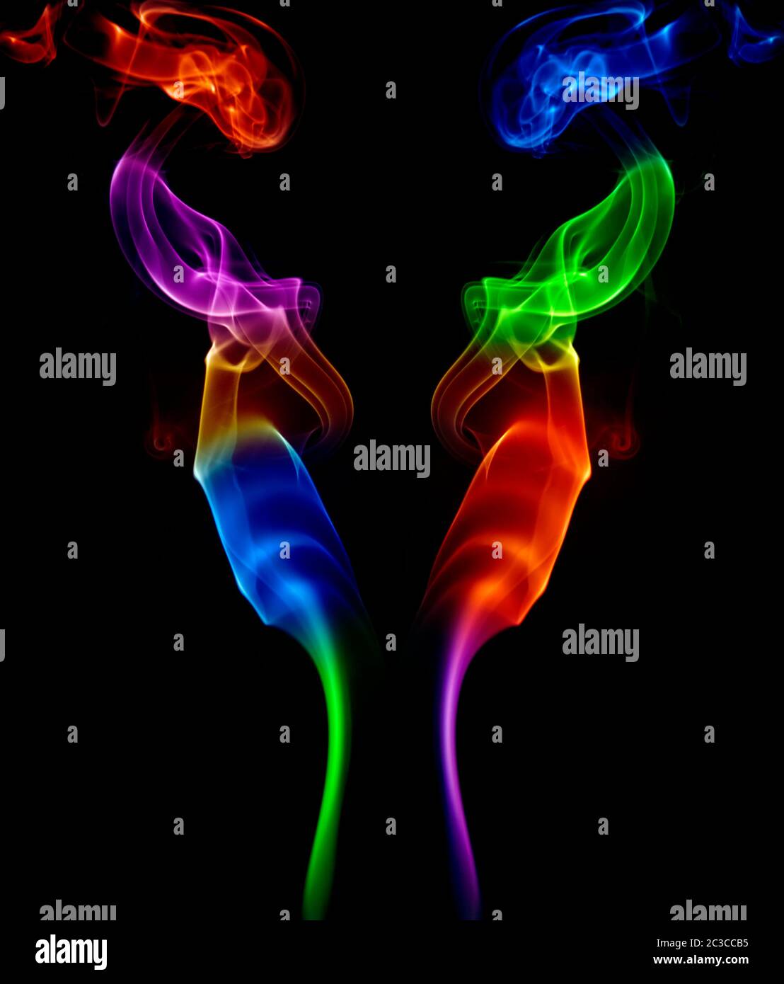 abstract colored smoke in a black background Stock Photo - Alamy