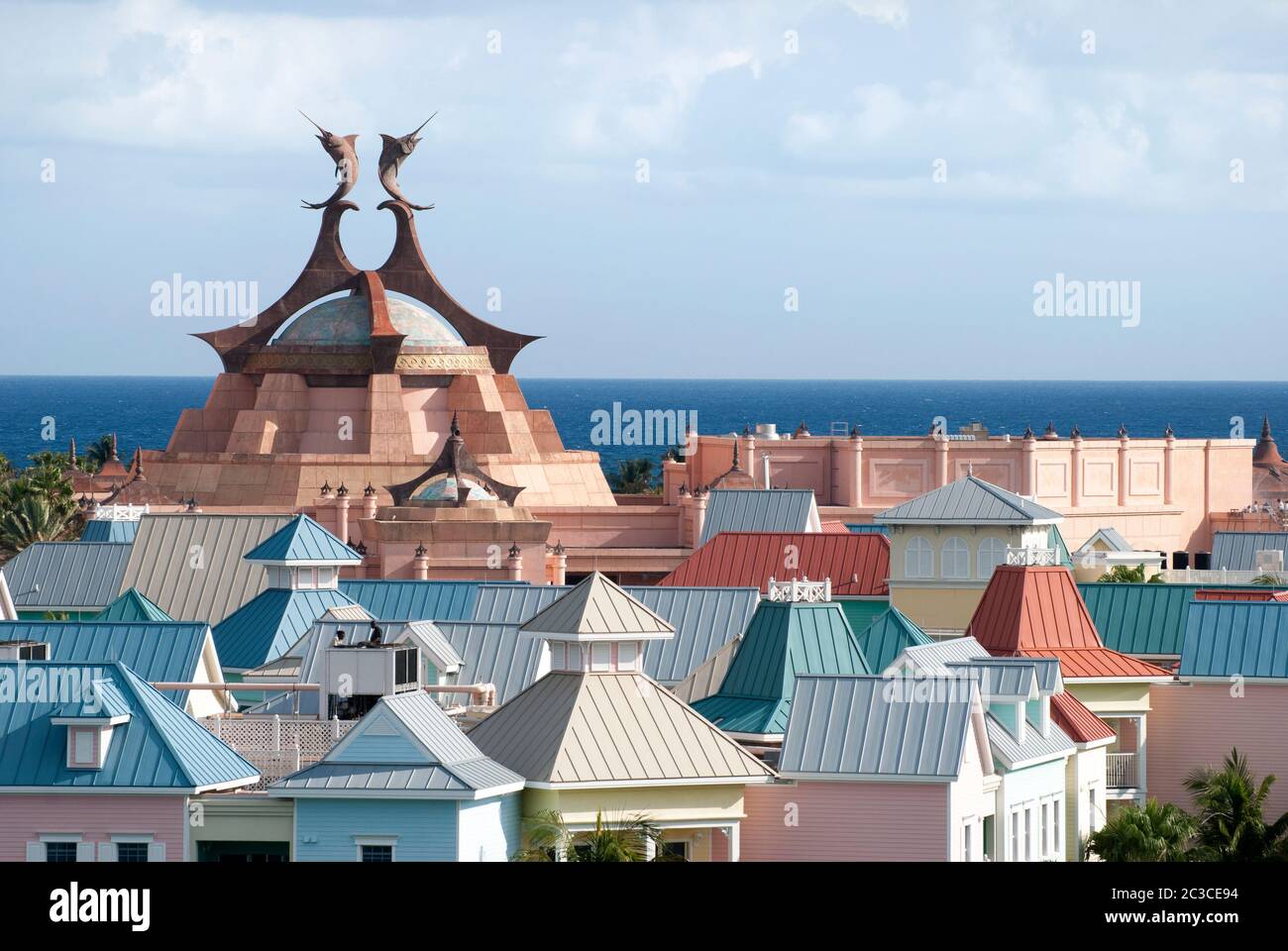 The view of colorful rooftops on Paradise Island with the horizon of Caribbean Sea in a background (Bahamas). Stock Photo