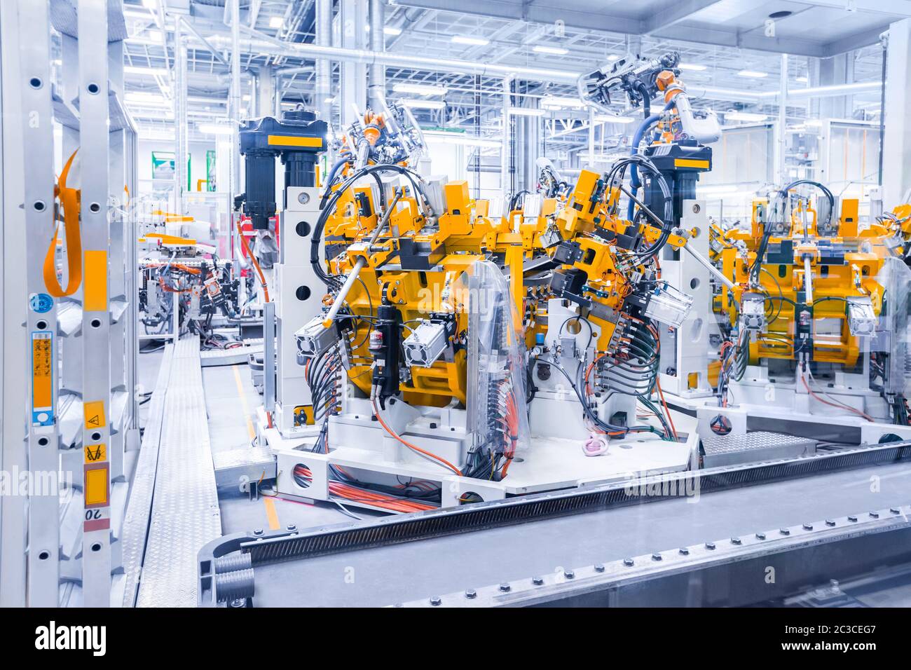 robotic arms in a car plant Stock Photo