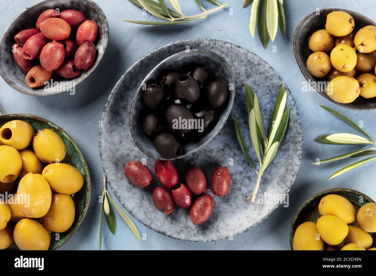 Olives, shot from the top. An assortment of green, black and red olives Stock Photo