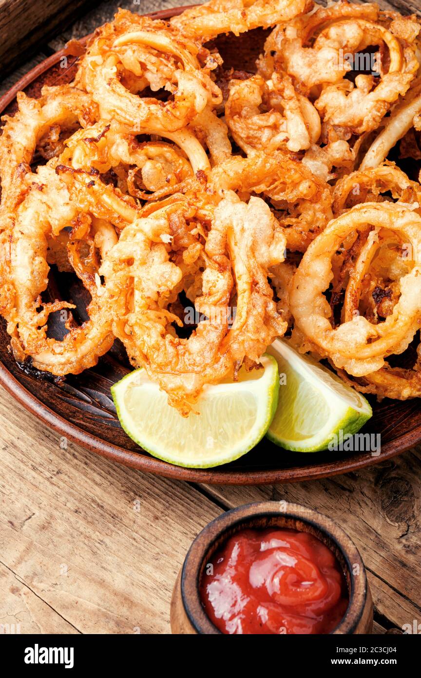 Roasted octopus calamari rings hi-res stock photography and images - Alamy