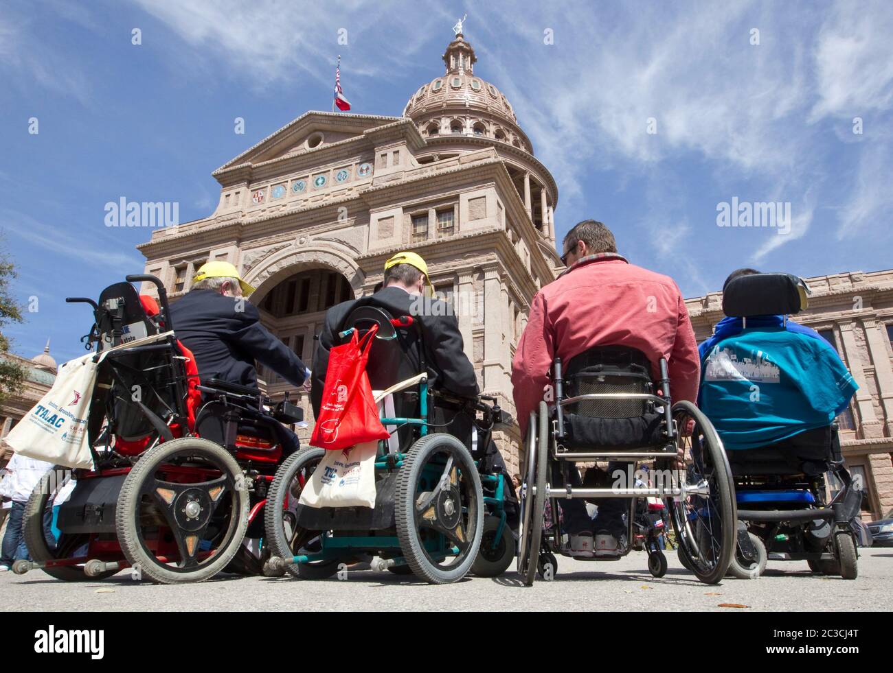 Austin, Texas USA, March 2013: Wheelchair-bound protesters at the Texas Capitol rally for increased Medicaid coverage after Gov. Rick Perry announced that the state will not accept any federal money to expand Medicaid in Texas. ©MKC/Bob Daemmrich Photography, Inc. Stock Photo