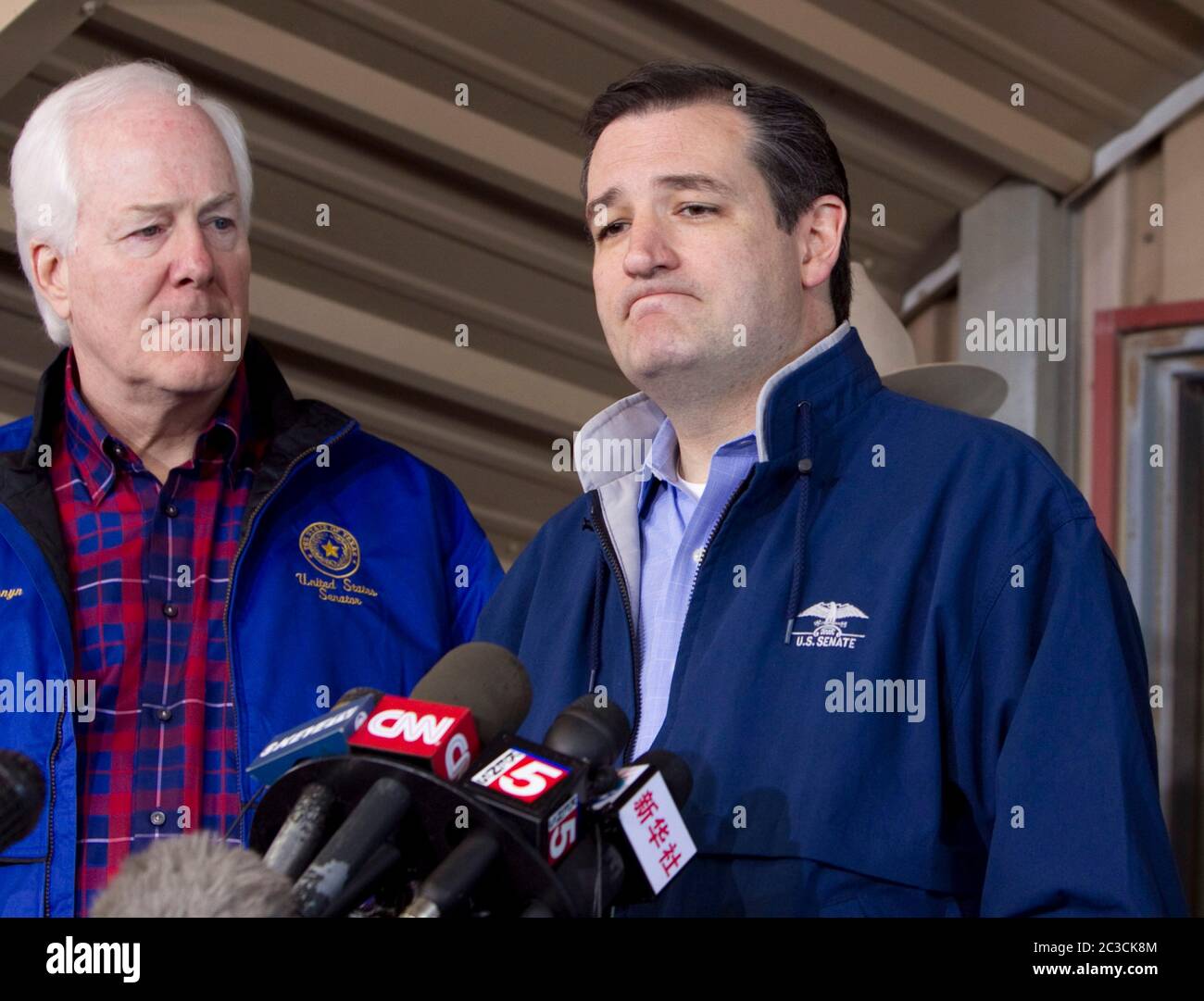 West, Texas USA, April 19 2013: U.S. Senator Ted Cruz of Texas speaks to reporters during a press conference two days after a fertilizer plant exploded in the small Central Texas town, killing 14 people and damaging or destroying hundreds of homes and businesses. Fellow Texas Sen. John Cornyn stands on the left. ©Marjorie Kamys Cotera/Daemmrich Photography Stock Photo