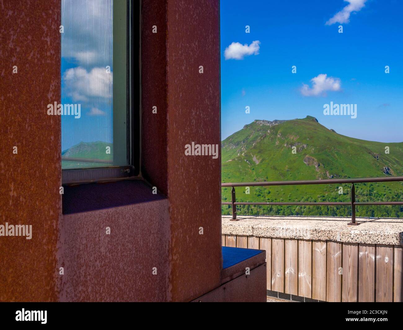 Window and mountain, Puy Mary, Cantal, Auvergne-Rhone-Alpes, France Stock Photo
