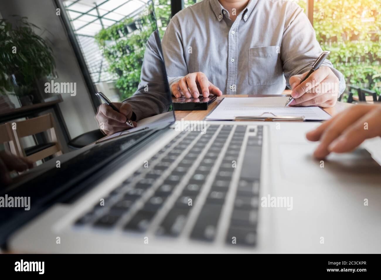 Business meeting  in outdoor. documents account managers crew working with new startup project Idea presentation, analyse marketing plans. Stock Photo