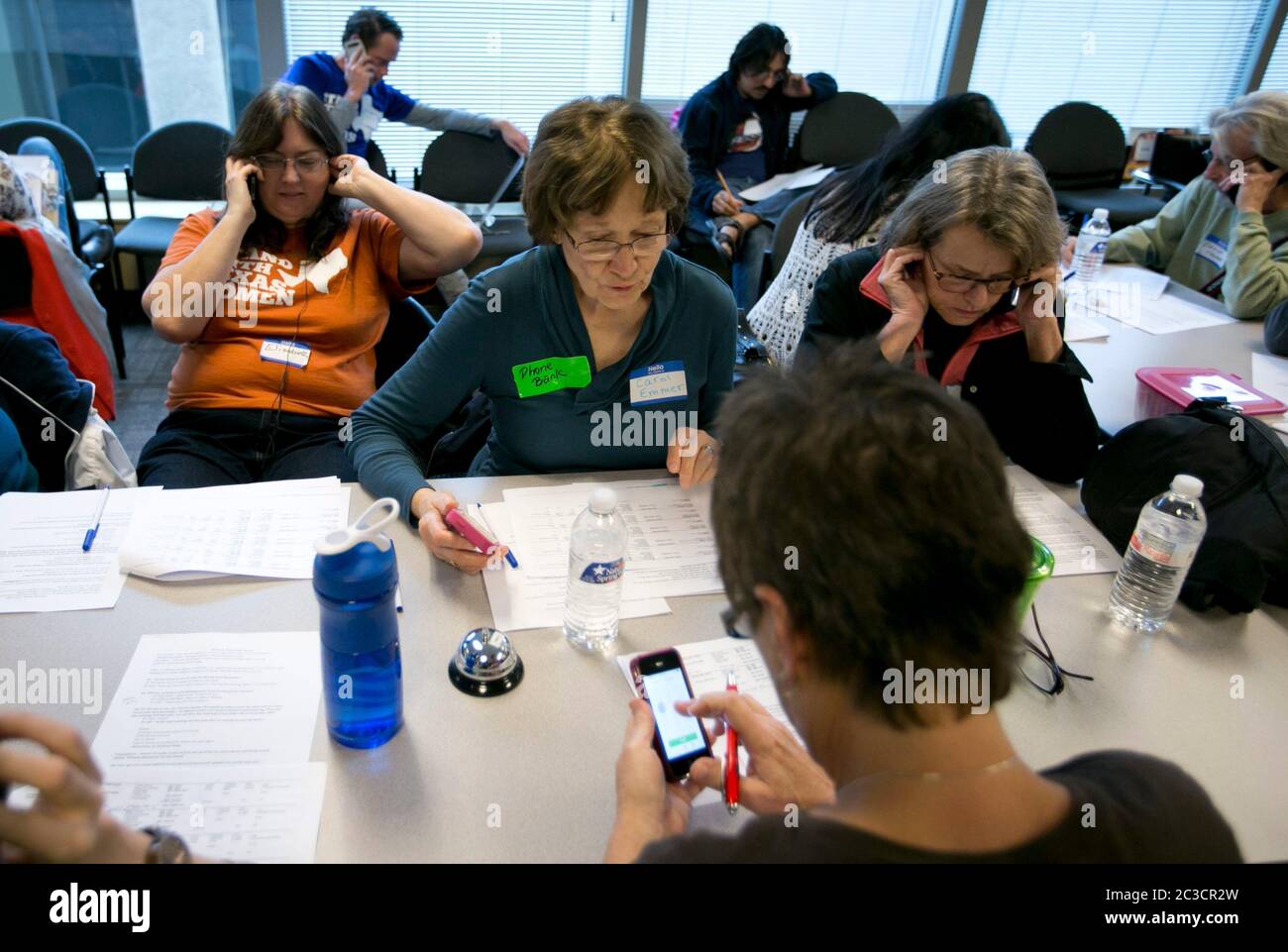 Austin Texas USA, Nov. 23 2013: Volunteers for Battleground Texas and the state Democratic Party make phone calls to potential voters in an attempt to 'turn Texas blue.' Texas has been a solidly 'red' Republican state for almost 20 years. ©MKC/Bob Daemmrich Photography, Inc. Stock Photo