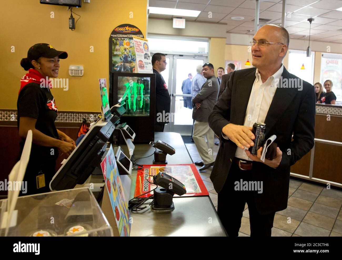 Austin Texas USA, August 6 2014: Carl's Jr. Restaurant CEO Andrew Puzder greets employees at an Austin location of the fast-food chain.  ©Marjorie Kamys Cotera/Daemmrich Photography Stock Photo