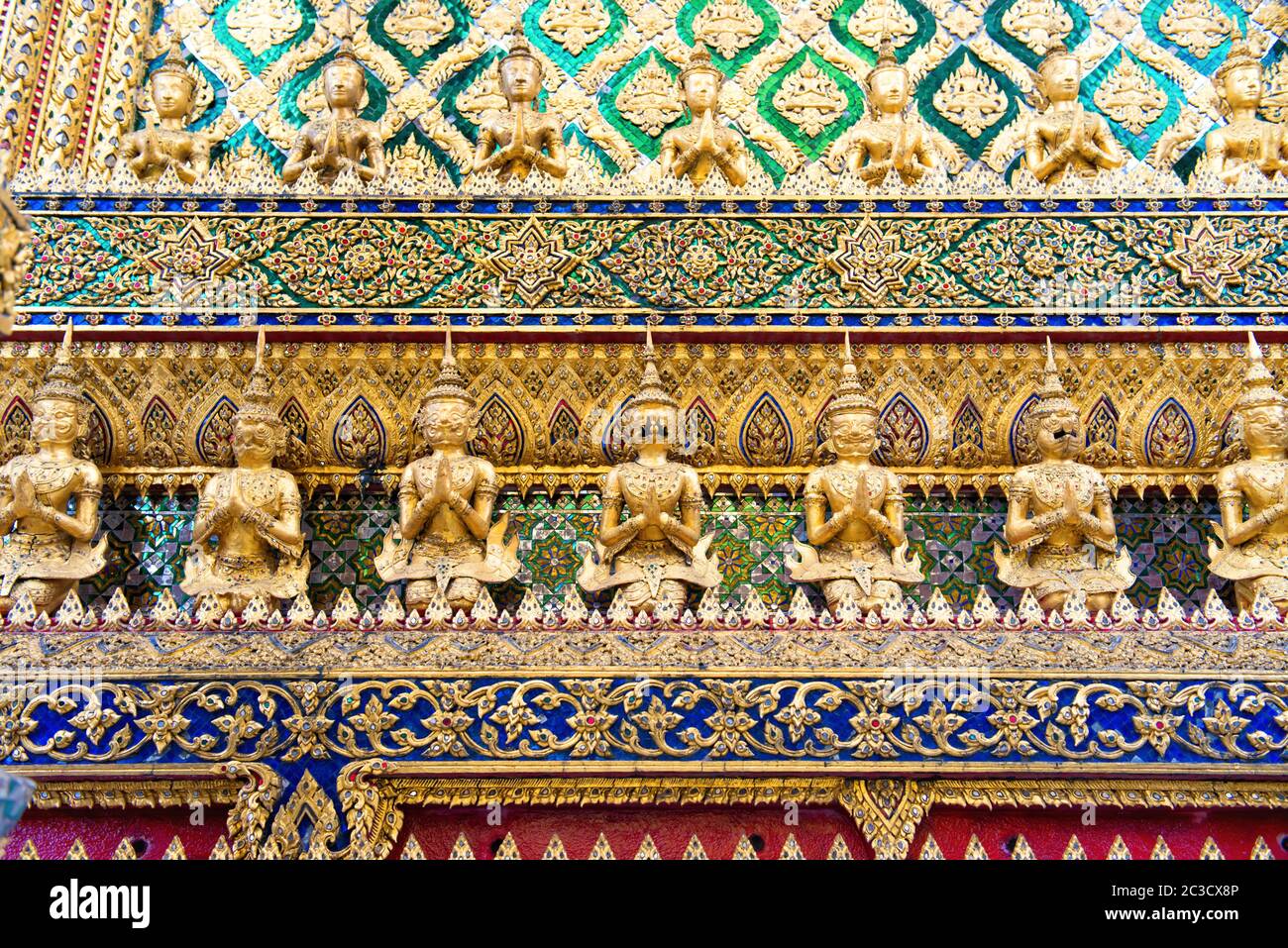 Beautiful traditional decor at wall of Temple of Emerald Buddha in Bangkok Stock Photo