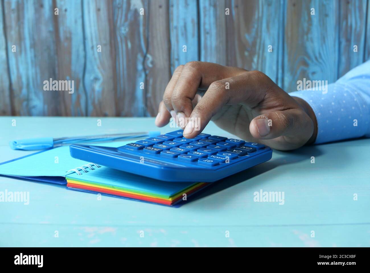 man hand using calculator on office desk  Stock Photo