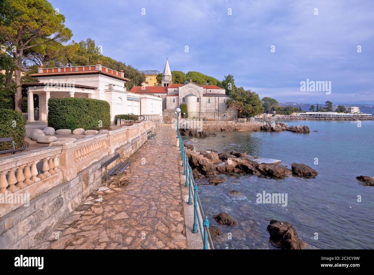 Adriatic town of Opatija watefront walkway and church view Stock Photo
