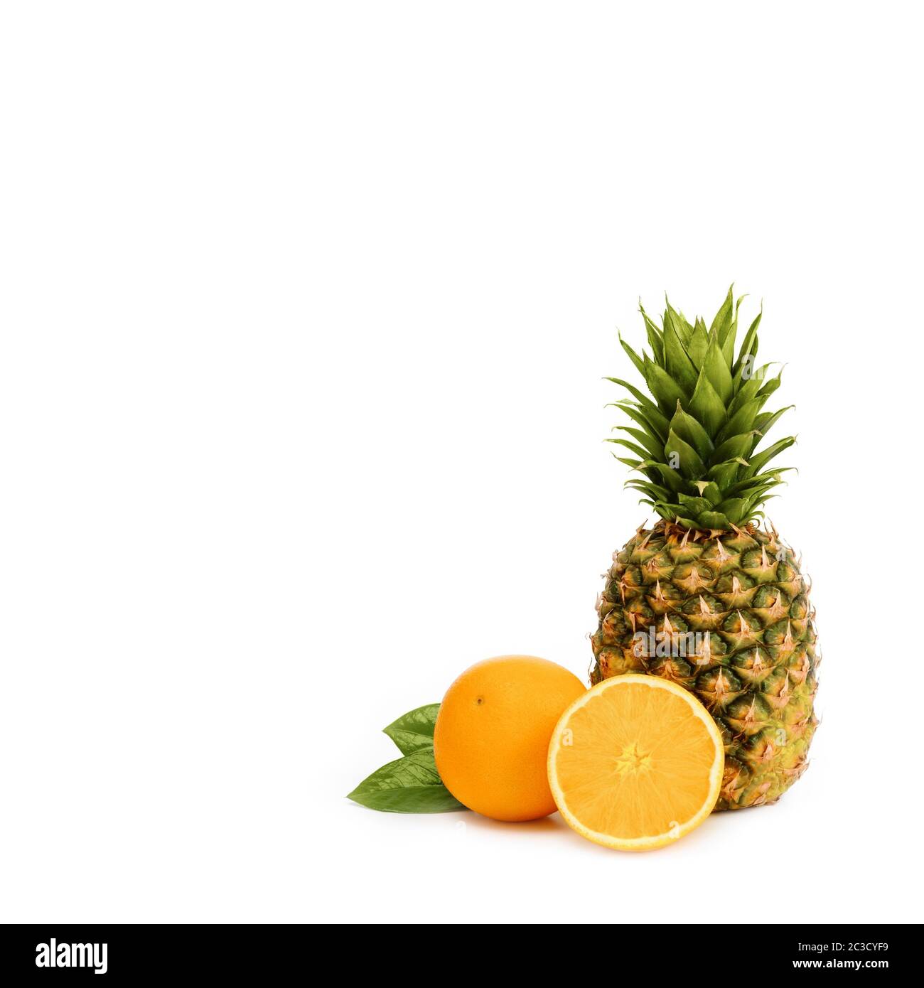 Pineapple and orange isolated on white background Stock Photo - Alamy