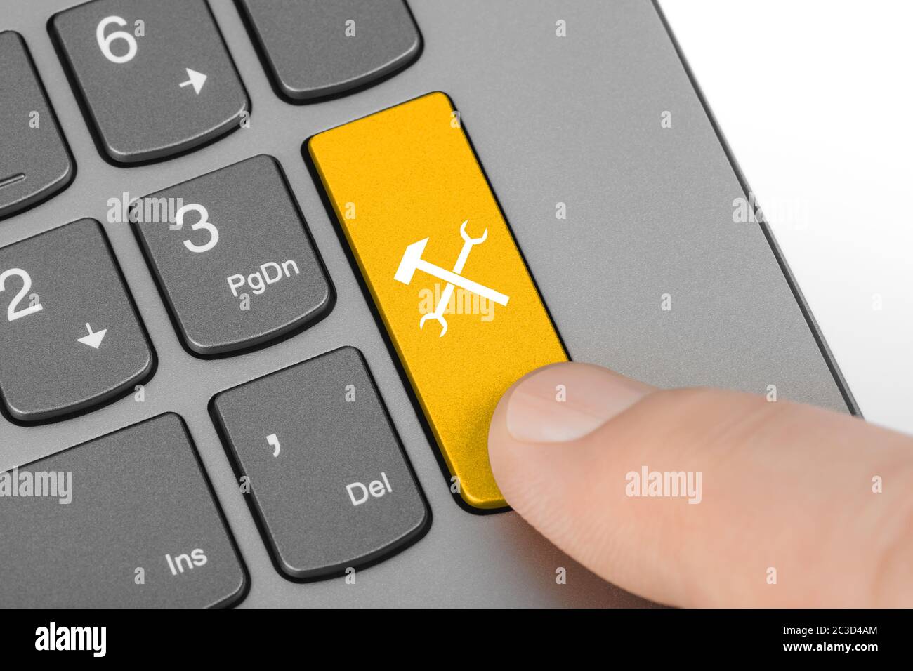 Computer keyboard with tools key Stock Photo Alamy