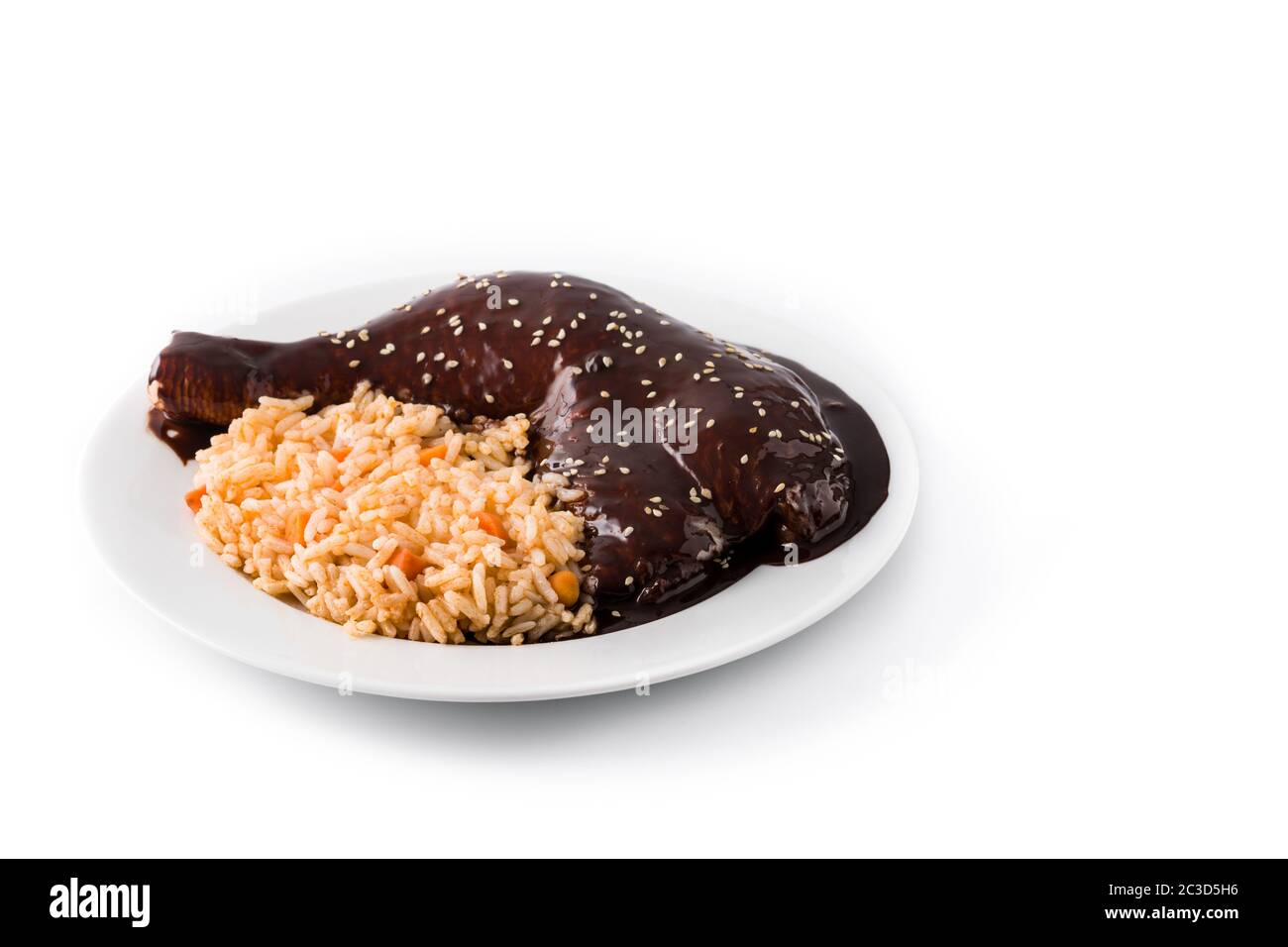 Traditional mole Poblano with rice plate isolated on white background Stock  Photo - Alamy
