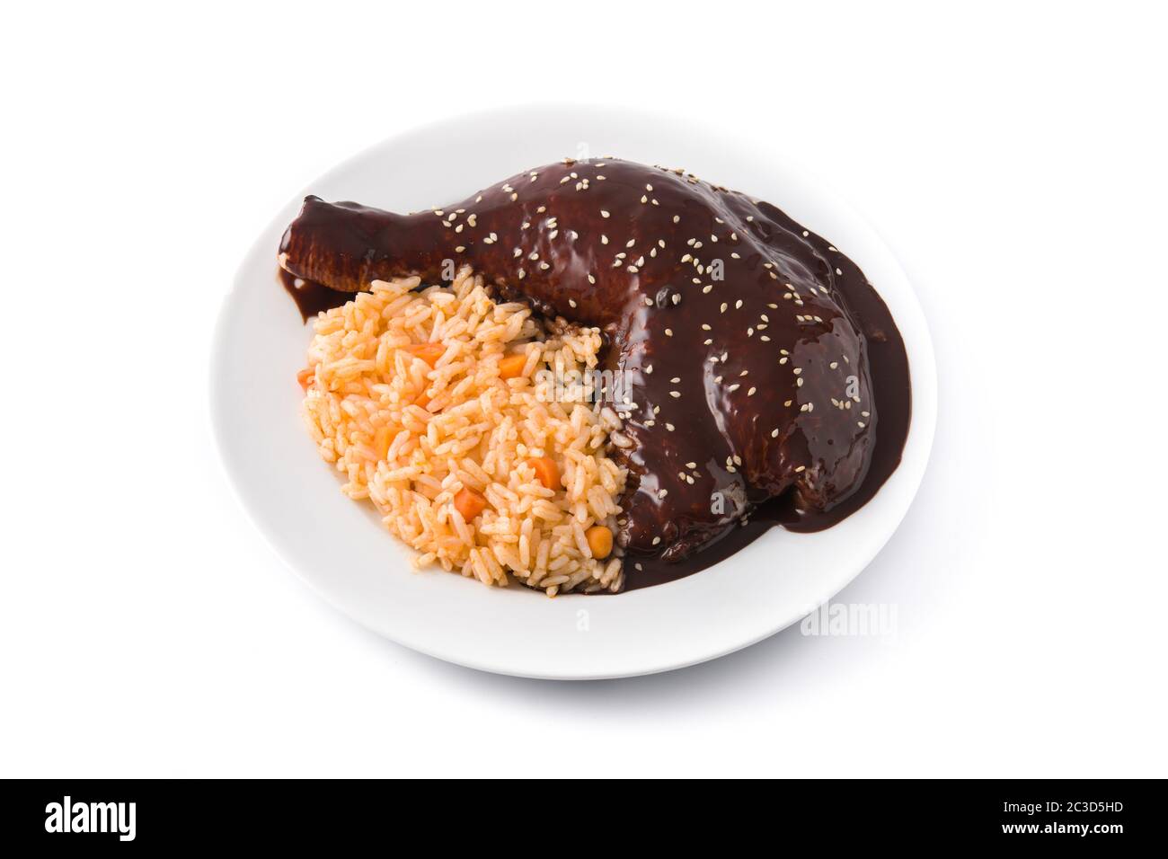 Traditional mole Poblano with rice plate isolated on white background Stock Photo