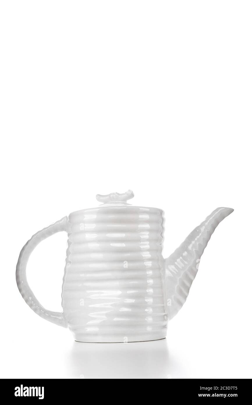 white stylish teapot on white isolated background Stock Photo