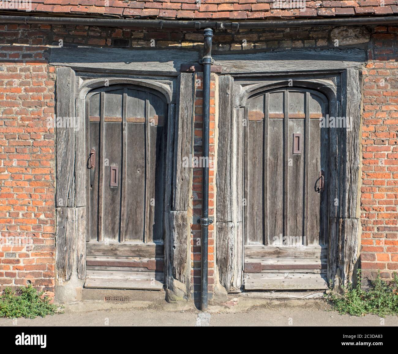 Old wooden doors in a house in the village of Shoreham,Kent,UK. Stock Photo