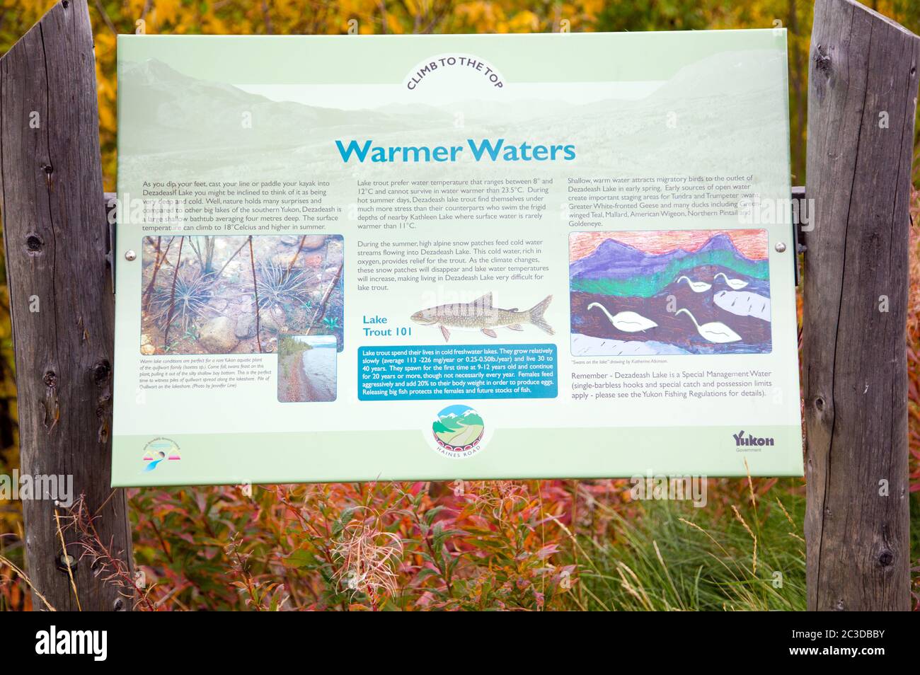 Signage alongside Dezadeash Lake in the Yukon Territories, Canada. Stock Photo