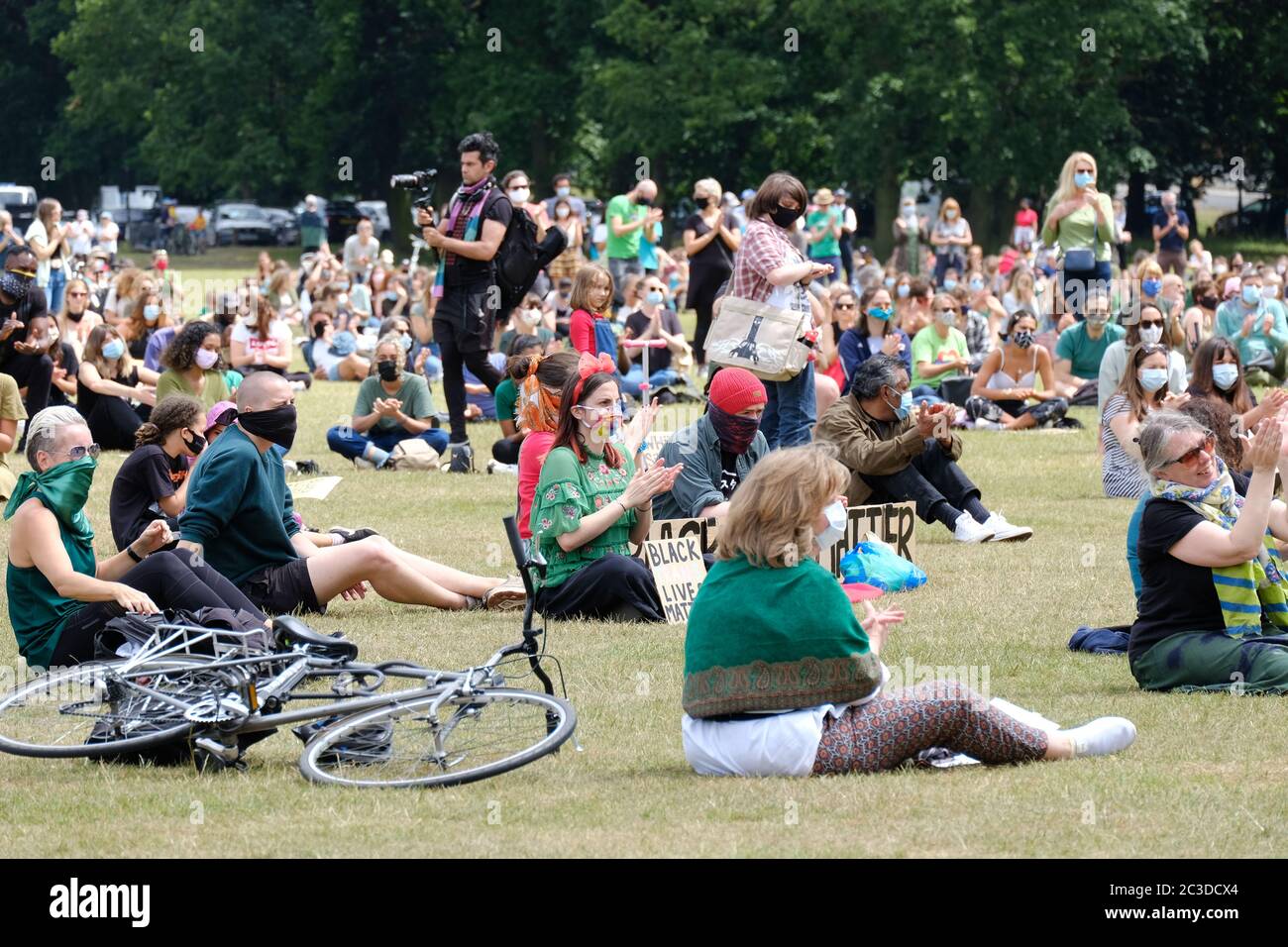 A Black Lives Matter protest takes place on Tooting Bec Common on the third anniversary of the Grenfell Tower disaster. Stock Photo