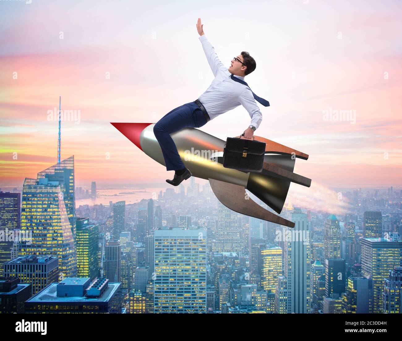 Businessman flying on rocket in business concept Stock Photo - Alamy