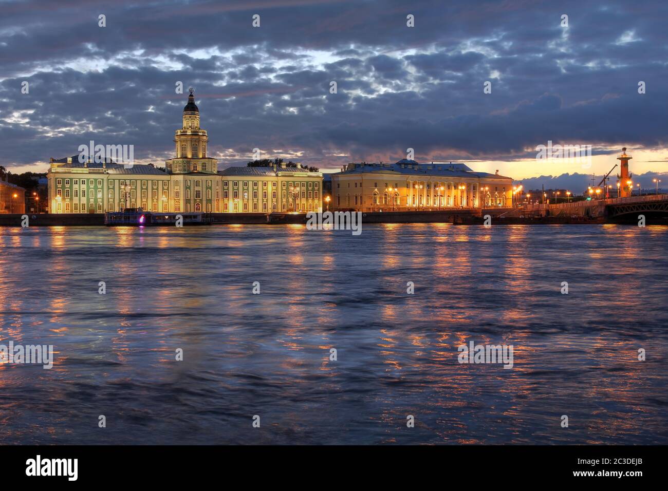 Waterfront along the Neva River in St Petersburg, Russia at twilight, featuring Kunstkammer